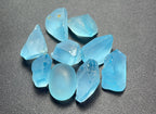 50 Gram Sky Blue Topaz 20 Gram Red Garnet