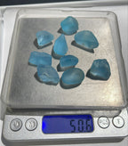 50 Gram Sky Blue Topaz 20 Gram Red Garnet