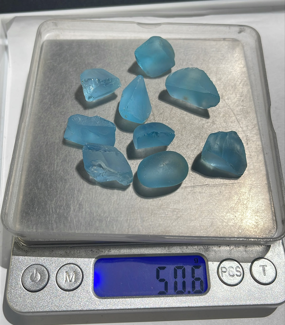 50 Gram Sky Blue Topaz 20 Gram Red Garnet