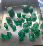 facet grade raw emeralds